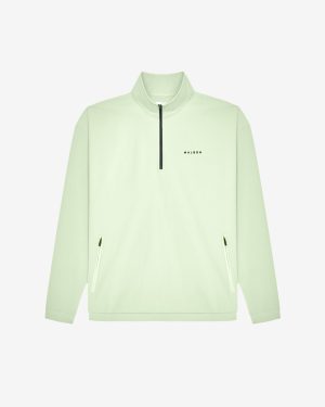 PERFORMANCE QUARTER ZIP SHELL PULLOVER