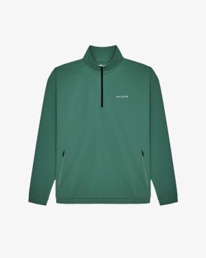 PERFORMANCE QUARTER ZIP SHELL PULLOVER